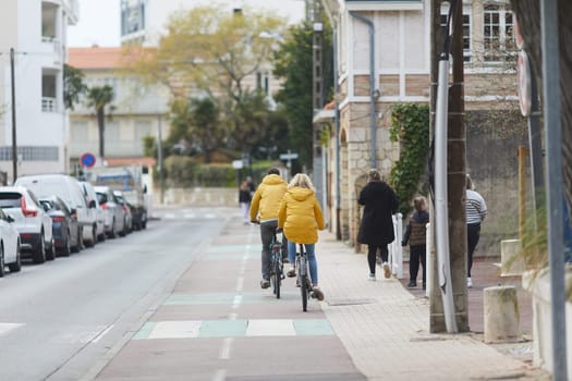 Person riding a bicycle on a cycle path a sunny day