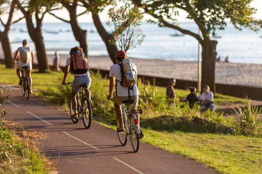 Person riding a bicycle on a cycle path a sunny day