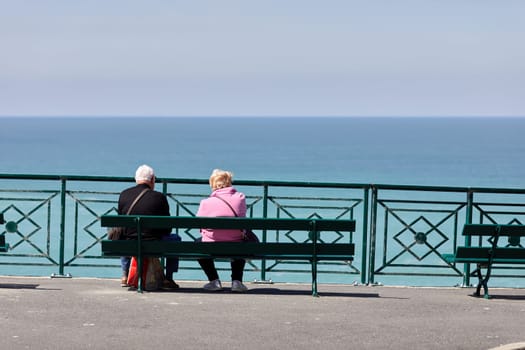 young Couple looking at the sea