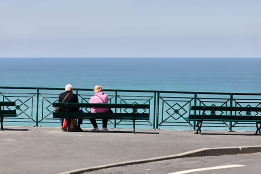 young Couple looking at the sea