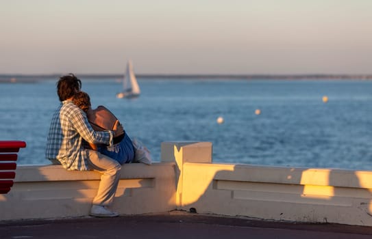 young Couple looking at the sea