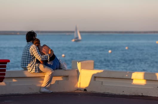 young Couple looking at the sea