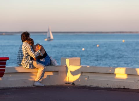 young Couple looking at the sea