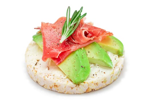 Rice Cake Sandwich with Fresh Avocado, Jamon and Rosemary - Isolated on White. Easy Breakfast. Diet Food. Quick and Healthy Sandwiches. Crispbread with Tasty Filling. Healthy Dietary Snack - Isolation