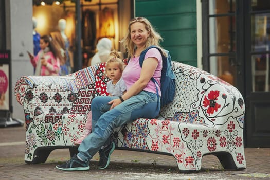 Mom and daughter walk in the Netherlands.