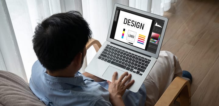 Graphic designer software for modern design of web page and commercial ads showing on the computer screen