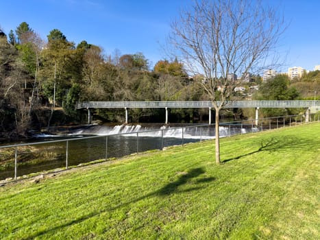 Hiker's point of view along the Corgo river city park in Vila Real, Portugal.