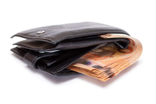 Black Leather Men Wallet with Fifty Euro Banknotes Inside - Isolated on White Background. A Purse Full of Money Symbolizing Wealth, Success and Social Status - Isolation