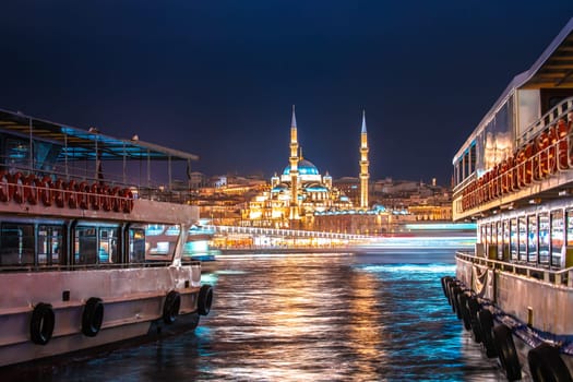Eminönü and Yeni Cami Mosque in Istanbul evening view, landmarks of Turkey