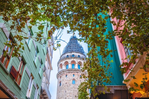 Galata tower and colorful architecture of Istanbul street view, largest city of Turkey