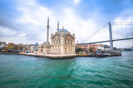 Ortakoy Mosque or Buyuk Mecidiye Camii and Bosphorus bridge in Istanbul view, landmarks of Turkey largest city 