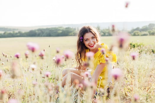 Woman in a field with flowers on a walk