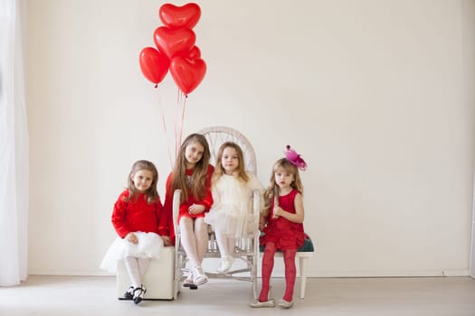 beautiful girls in red and white clothes on birthday party