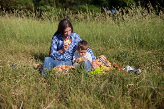 woman plays with beloved son on a walk