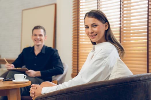 Psychological consultation gaining improvement on mental problem, happy young female patient doing therapy session while psychiatrist making diagnostic on mental illness. Unveiling