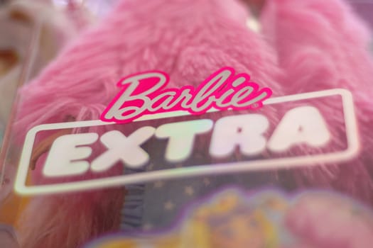 Tyumen, Russia-November 25, 2023: Barbie extra logo, produced by the American toy manufacturing company Mattel, Inc. Selective focus