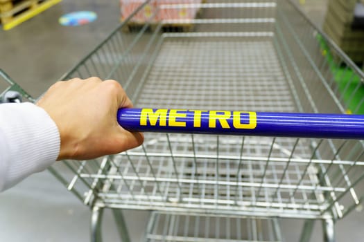 Tyumen, Russia-November 04, 2023: Metro logo Group is a German global diversified retail. Selective focus