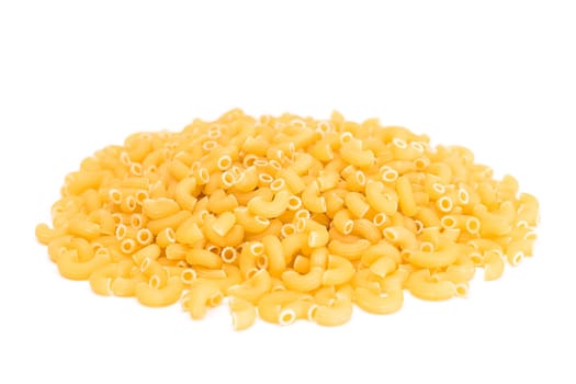 A Heap of Uncooked Chifferi Rigati Pasta Isolated on White Background. Fat and Unhealthy Food. Classic Dry Macaroni Texture. Italian Culture and Cuisine. Raw Pasta - Isolation
