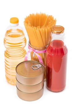 Food Reserves: Canned Food, Spaghetti, Tomato Juice, Pasta and Grocery - Isolated on White Background. Emergency Food Storage in Case of Crisis. Strategic Food Supplies - Isolation