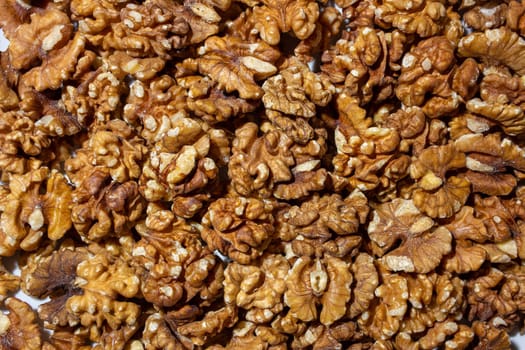 Scattered Shelled Walnuts. Background from Walnut. Natural High-Calorie Snacks