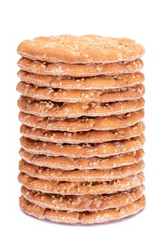 A Stack of Round Salt Crackers with Sesame Isolated on White Background. Dry Snacks - Isolation