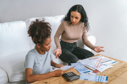 Stressed African American women has financial problems with credit card debt to pay crucial show concept of bad personal money and mortgage pay management crisis.