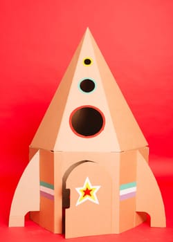 Cardboard space rocket. Concept image