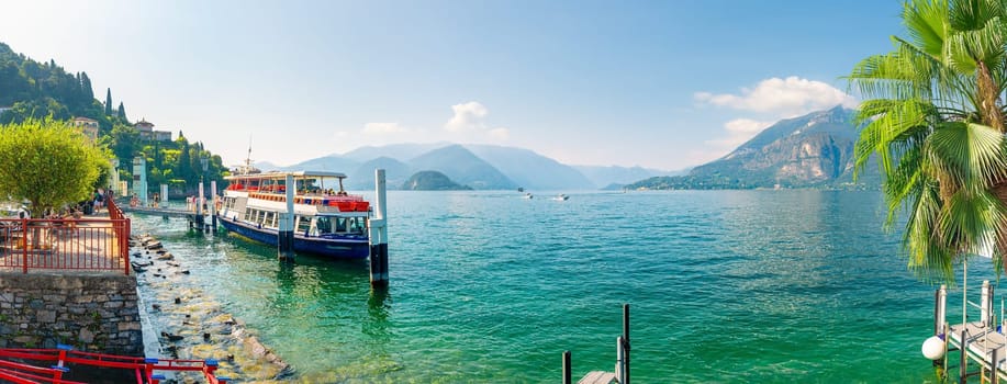 Ferry in the city of Varenna in the Lake Como region. Italian traditional village by the lake. Italy, Europe.