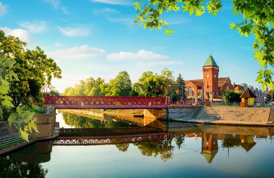 Sand bridge on Wyspa Piasek island and indoor market in Wroclaw, Poland