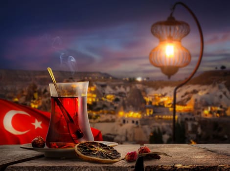 View of Cappadocia and a cup of Turkish tea