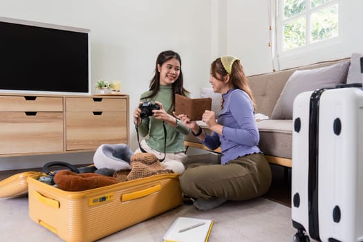 Woman and friend packing a suitcase for a new travel trip. bag and luggage for journey.