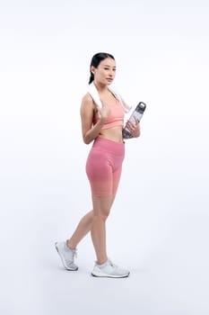 Athletic and sporty asian woman resting and drink water after intensive cardio workout training. Healthy exercising and fit body care lifestyle pursuit in studio shot isolated background. Vigorous