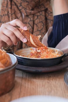 Turkish Menemen omelet in a frying pan.