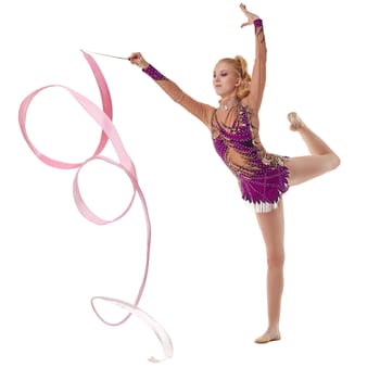 Studio photo of artistic gymnast dancing with ribbon