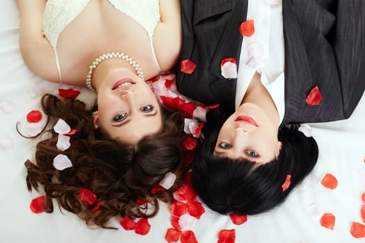 Same-sex marriage. Top view of happy couple posing at camera