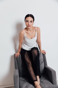 fashionable woman posing in studio