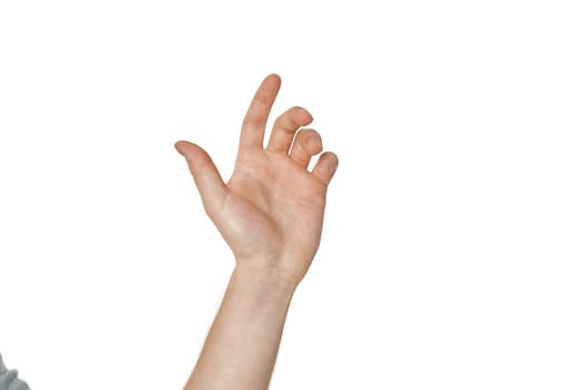 Male hand reaches for something on white studio background.