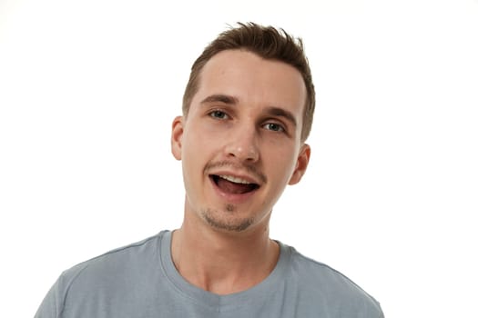 portrait of young smiling man on white background