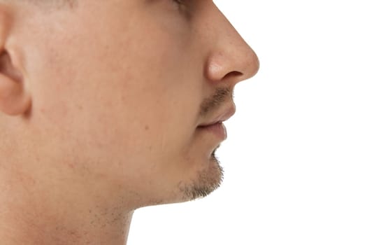 profile of male nose on white studio background