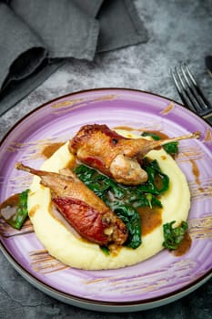 baked chicken wings with gravy, spinach and mashed potatoes