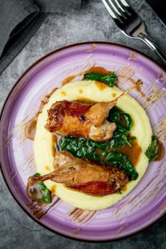 baked chicken wings with gravy, spinach and mashed potatoes