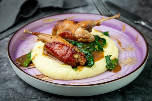 baked chicken wings with gravy, spinach and mashed potatoes