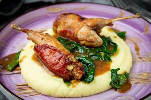 baked chicken wings with gravy, spinach and mashed potatoes