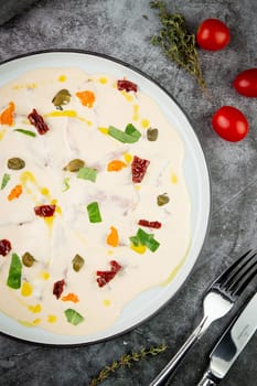 yogurt with additions of syrup, dried fruits and pieces of nuts