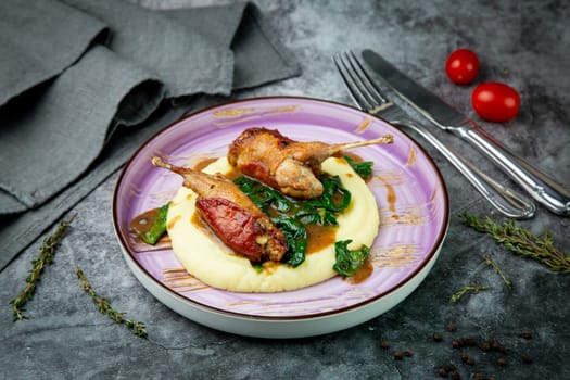 baked chicken wings with gravy, spinach and mashed potatoes