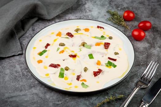 yogurt with additions of syrup, dried fruits and pieces of nuts