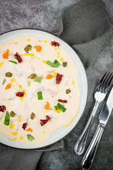 yogurt with additions of syrup, dried fruits and pieces of nuts