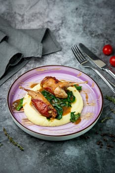 baked chicken wings with gravy, spinach and mashed potatoes