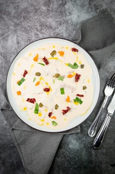 yogurt with additions of syrup, dried fruits and pieces of nuts