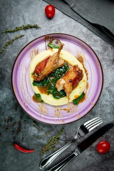 baked chicken wings with gravy, spinach and mashed potatoes